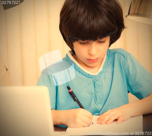 Image of child doing homework