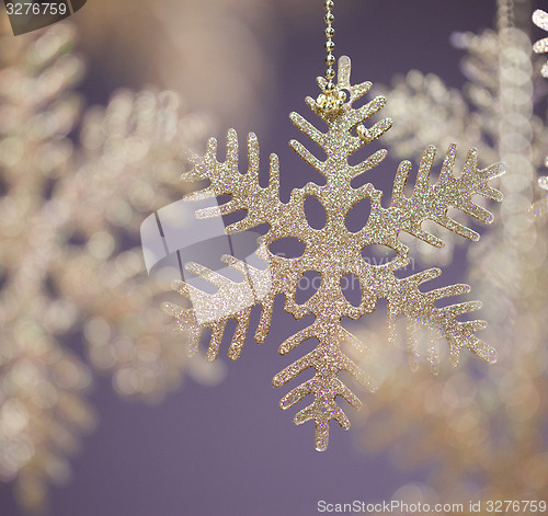 Image of Gold Christmas snowflakes