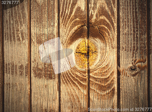 Image of aged boards with knot