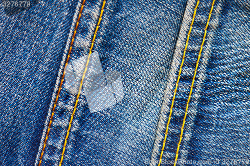 Image of two stitches on jeans