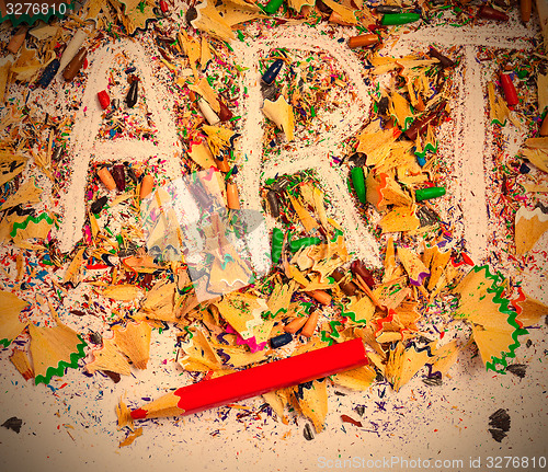 Image of art word on the background of pencil shavings