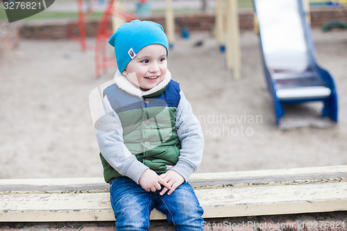 Image of Little boy on playground