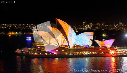 Image of Sydney Opera House in bright patterns of orange and blue Vivid S