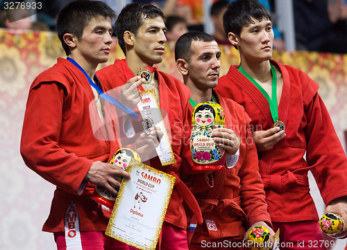 Image of Khasanov E., Sukhomlinov E., Ernazov S., Serikov N., on podium