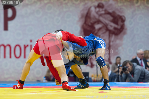 Image of Kanzhanov Beimbet (R) and Umbayev Nasimi (B)  fight