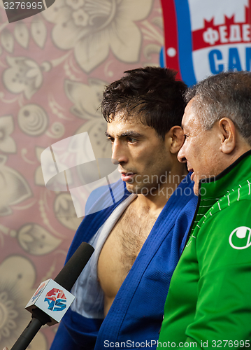 Image of Umbayev Nasim gives an interview