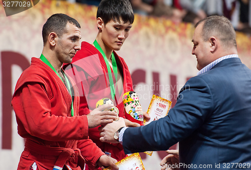 Image of Ernazov Sarbon and Serikov Nurbol on podium