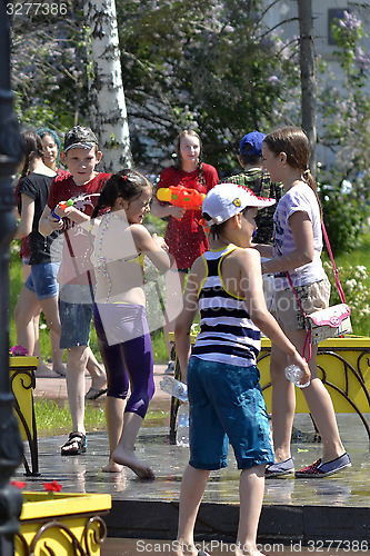 Image of The game "Water Fight" in honor of opening of a summer season on