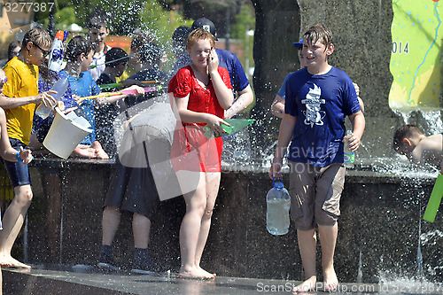 Image of The game "Water Fight" in honor of opening of a summer season on