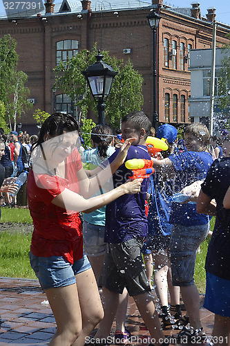 Image of The game "Water Fight" in honor of opening of a summer season on