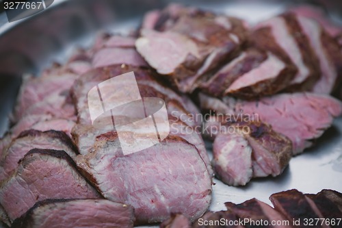 Image of Meat on BBQ. Shallow DOF.