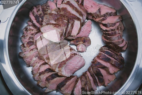 Image of Meat on BBQ. Shallow DOF.