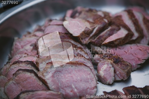 Image of Meat on BBQ. Shallow DOF.