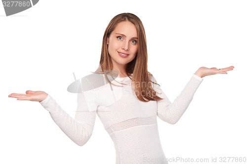 Image of Surprised woman showing open hand palm
