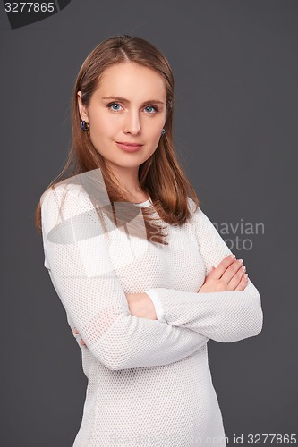 Image of Portrait of a woman with folded hands