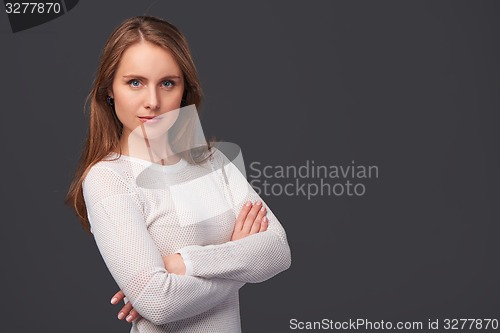 Image of Portrait of a woman with folded hands