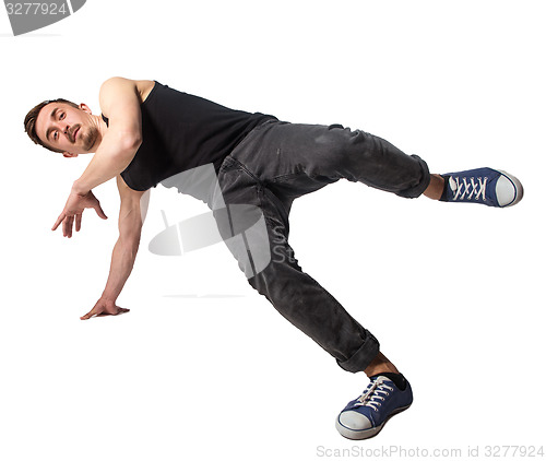 Image of Break dancer doing one handed handstand against a white background