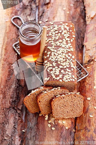 Image of bread with honey and oats