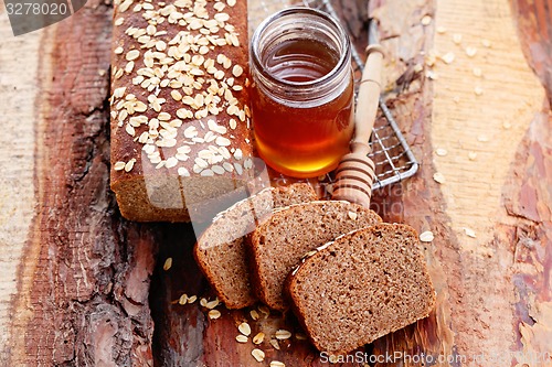 Image of bread with honey and oats