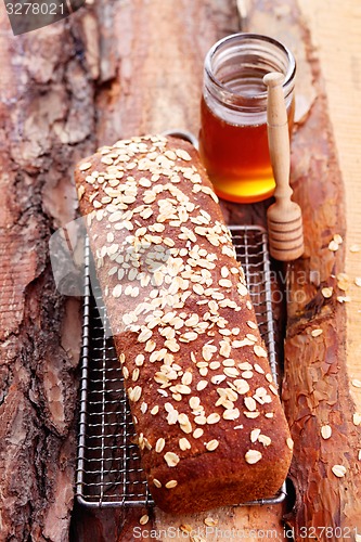 Image of bread with honey and oats