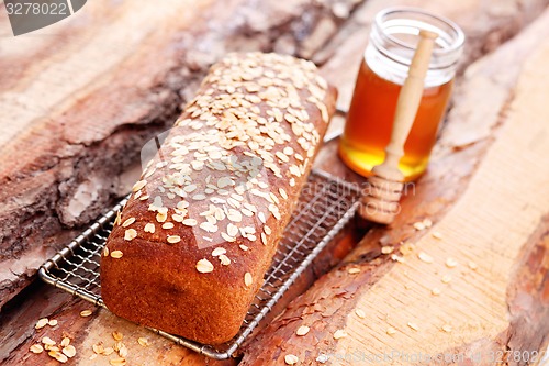 Image of bread with honey and oats