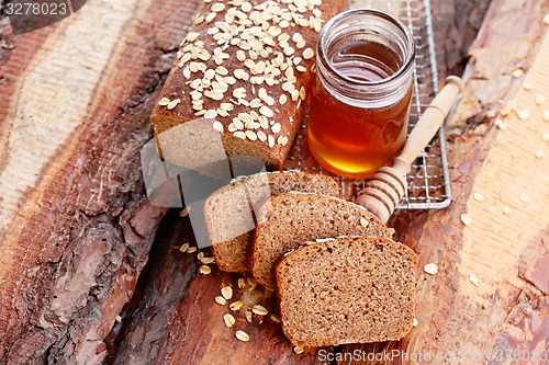 Image of bread with honey and oats