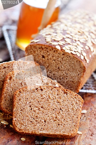 Image of bread with honey and oats