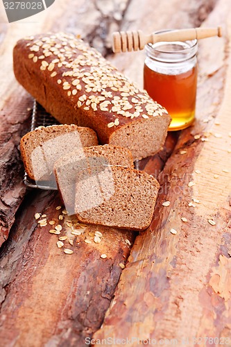 Image of bread with honey and oats