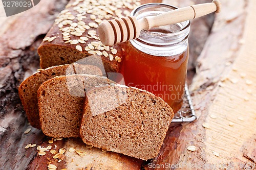 Image of bread with honey and oats