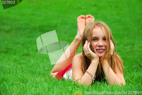 Image of Young girl grass