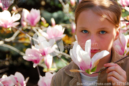 Image of Girl with magnolia