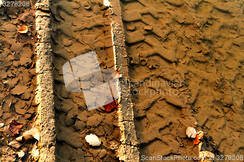 Image of Dirty broken rural road 