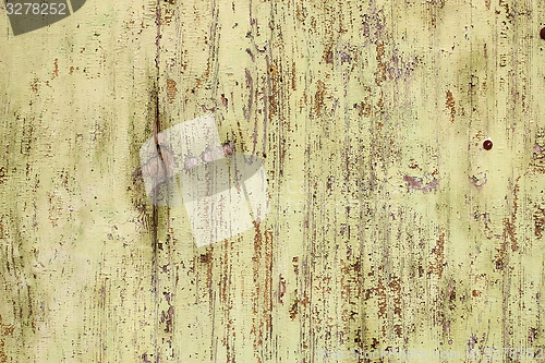 Image of old weathered paint on wooden surface