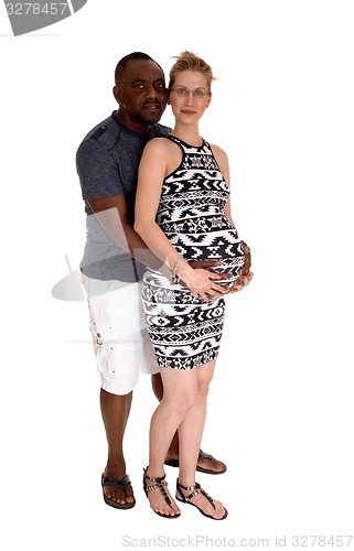 Image of White woman pregnant black man.