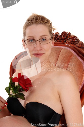 Image of Pregnant woman in armchair.