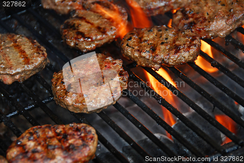 Image of Hamburgers on barbeque