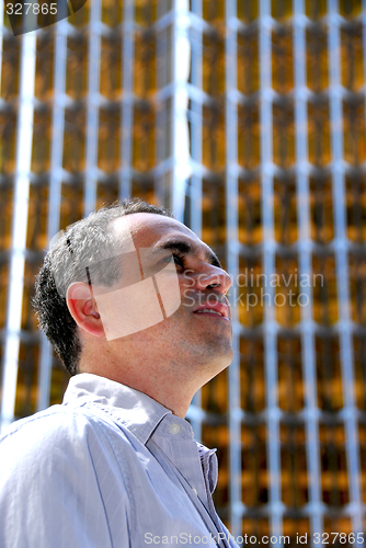 Image of Businessman looking up