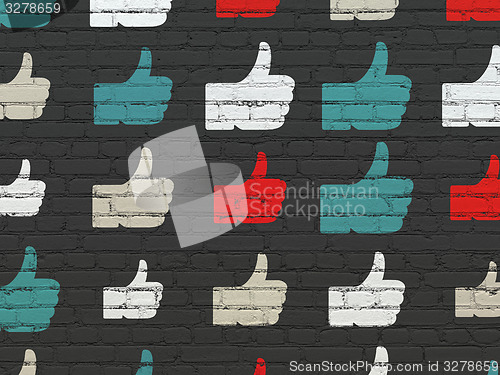 Image of Social media concept: Thumb Up icons on wall background