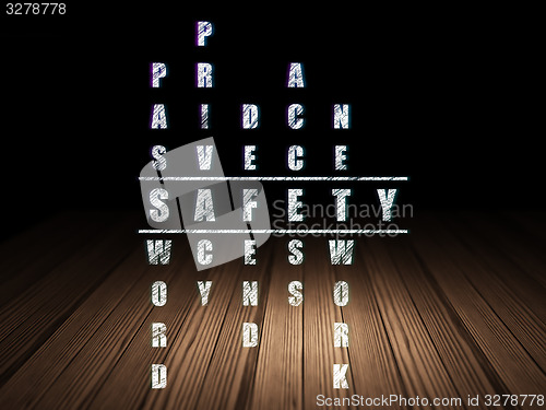Image of Safety concept: word Safety in solving Crossword Puzzle