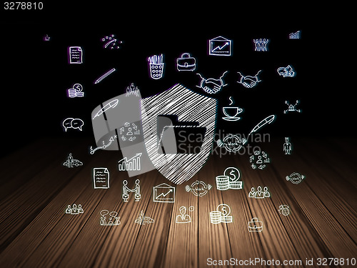 Image of Business concept: Folder With Shield in grunge dark room