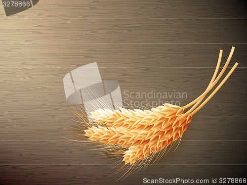 Image of Wheat on wooden background. EPS 10