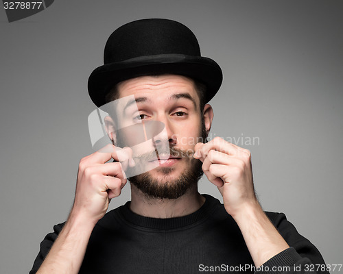 Image of Young attractive macho stylish fashionable guy.