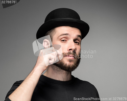 Image of Young attractive macho stylish fashionable guy.