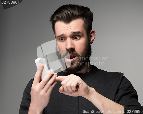 Image of Portrait of man talking on the phone