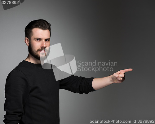Image of The man pointing a great idea - over gray background