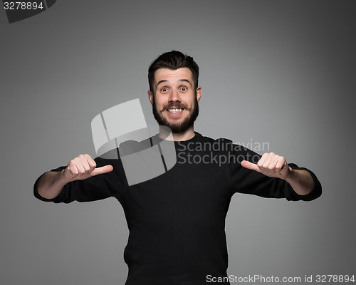 Image of young man pointing himself