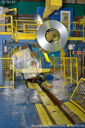 Image of crane loading Coil steel in Steel plant