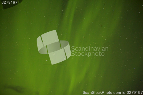 Image of Northern lights with bright stars in Iceland