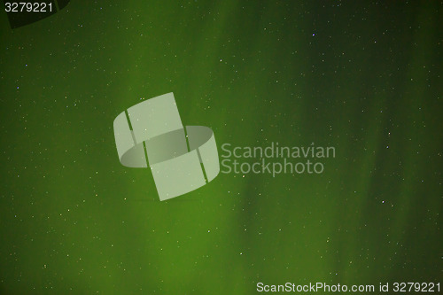 Image of Northern lights with bright stars in Iceland