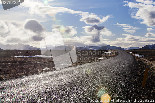 Image of Snowy volcano landscape with dramatic clouds in Iceland